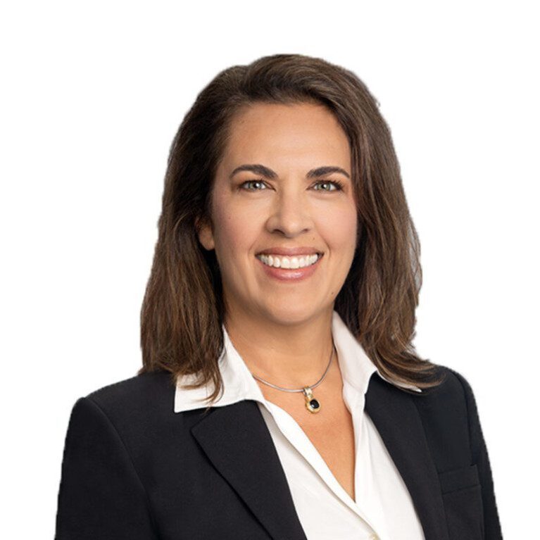 Smiling woman in a business suit.